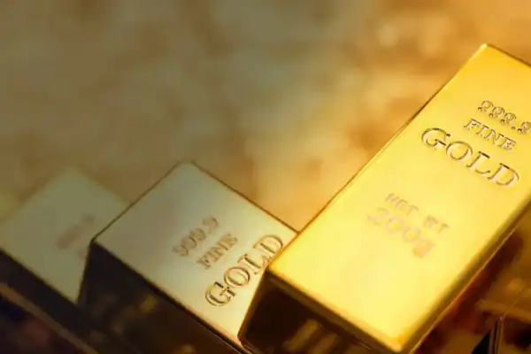 Ouro fecha em alta e encerra semana de ganhos mesmo com alta de juros pelo Fed